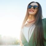woman smiling in sunshine