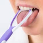 brushing tongue